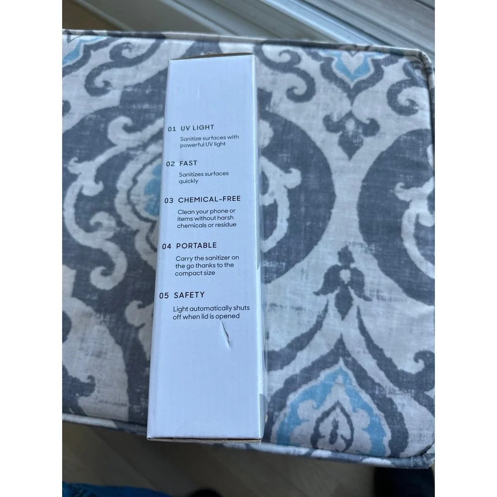 Sharper Image UV-ZONE Phone Sanitizer in box